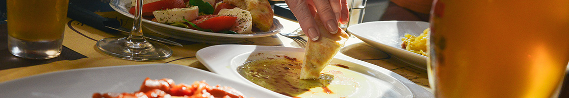Eating Mediterranean at Al-basha Mediterranean Grill & Hookah restaurant in Charlotte, NC.